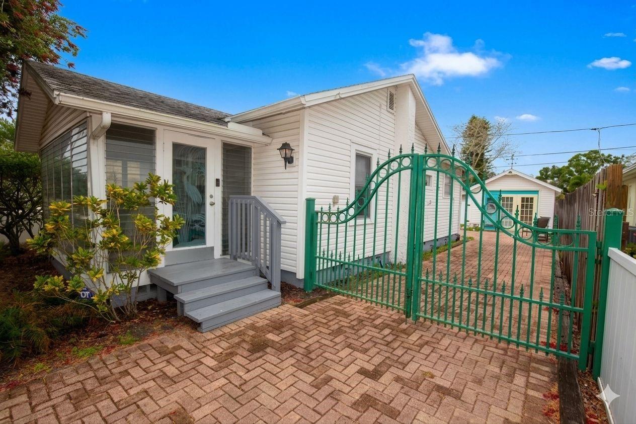 Nice gates accent the large driveway