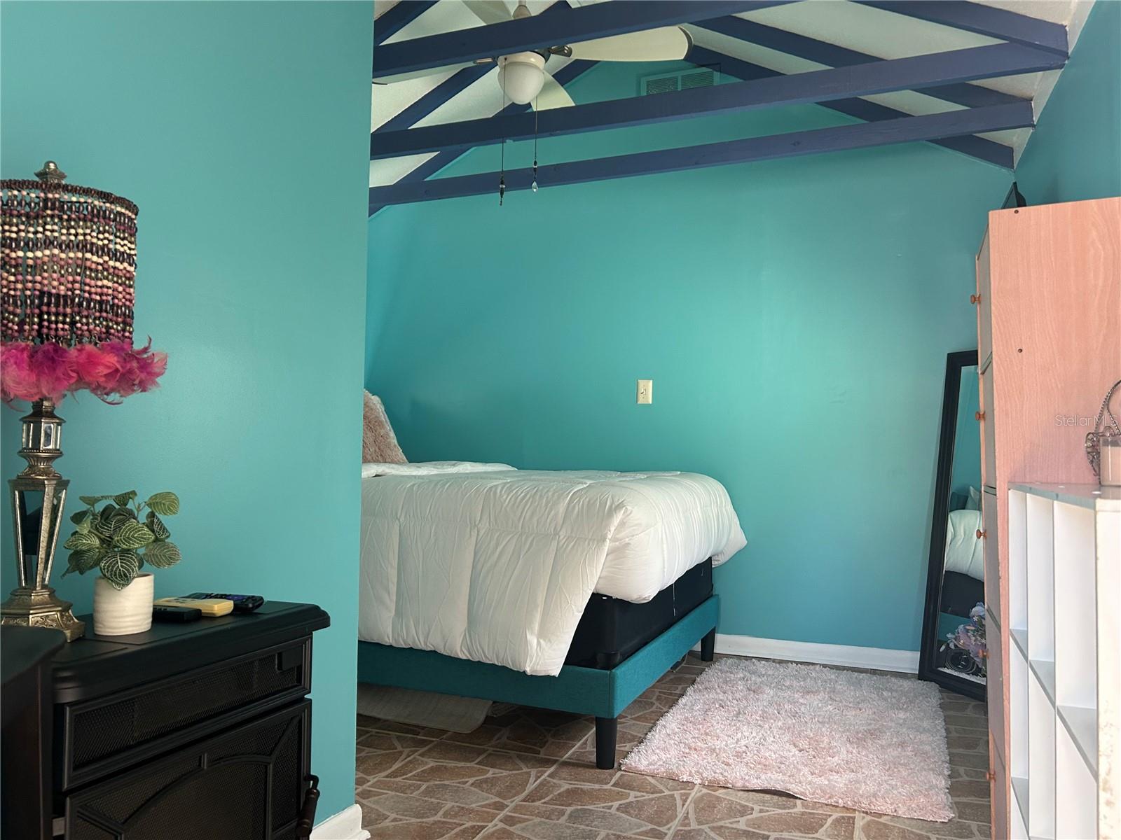 Studio has a bathroom with a sink and small shower