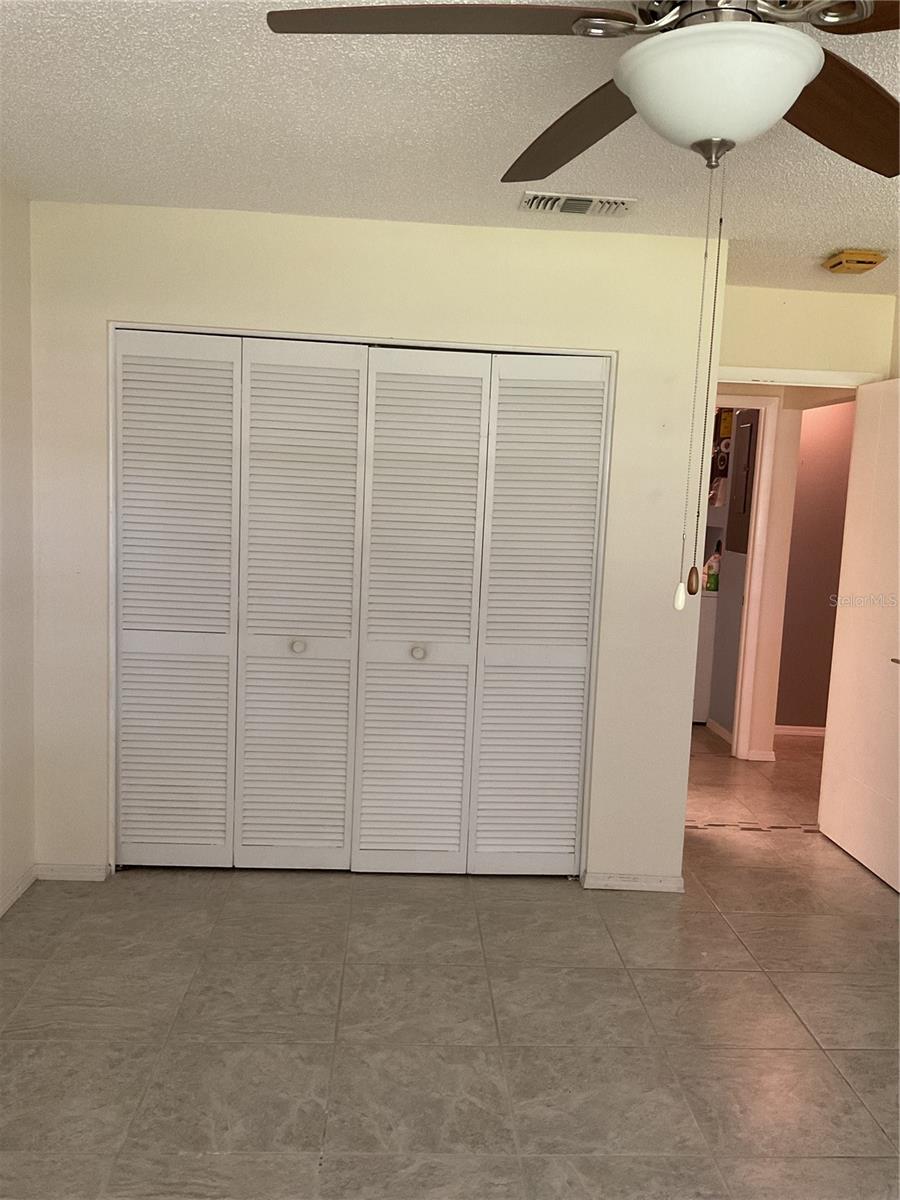 2ND BEDROOM.  WINDOW HAS PLANTATION SHUTTERS.