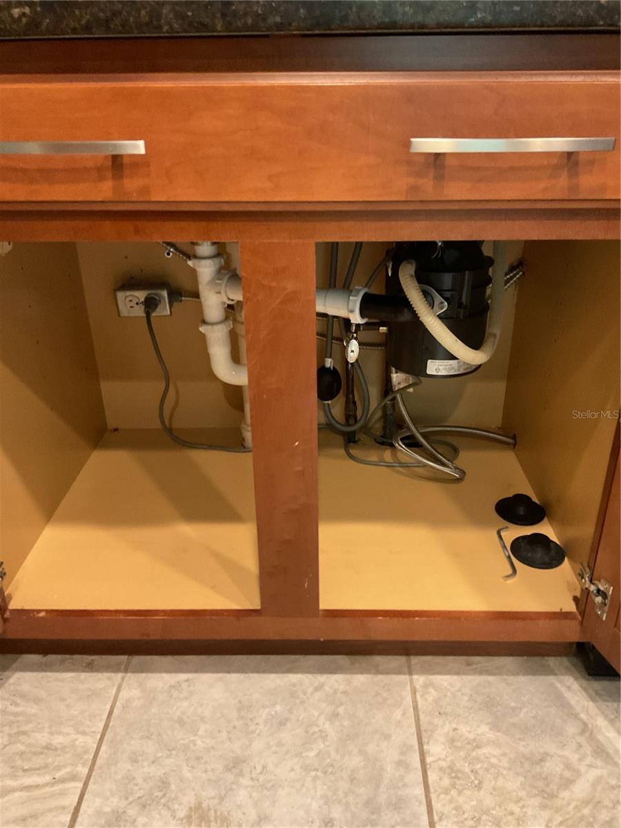 UNDER KITCHEN SINK/GARBAGE DISPOSAL