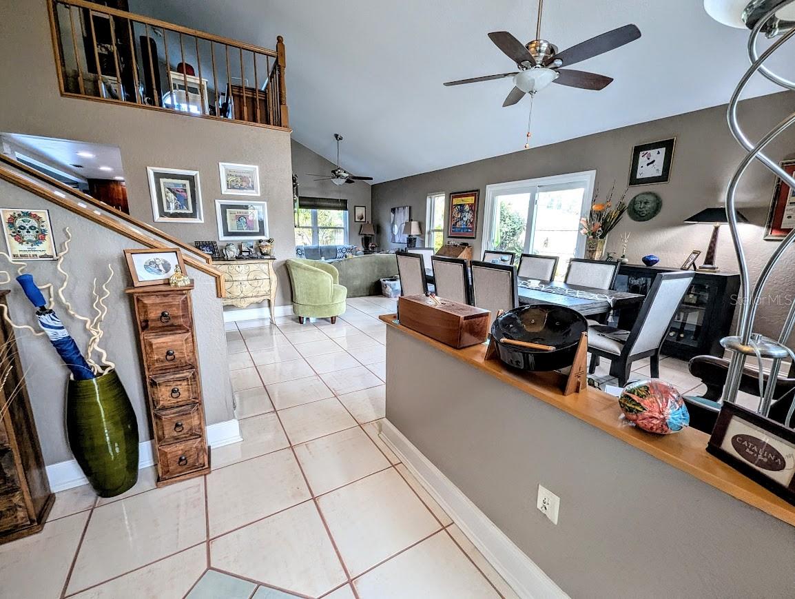 Entry with view of great room and loft