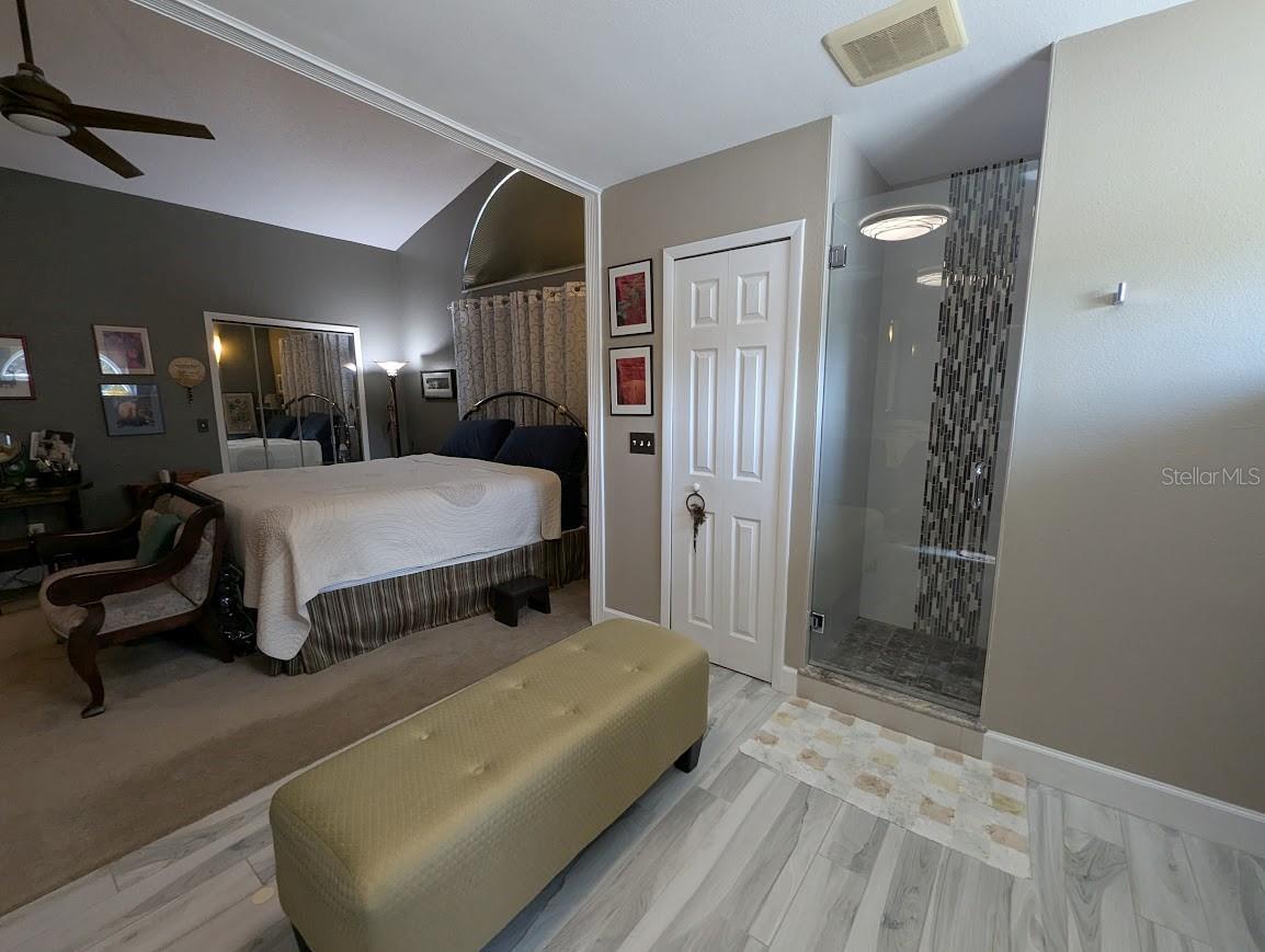 View of entry to shower and linen closet