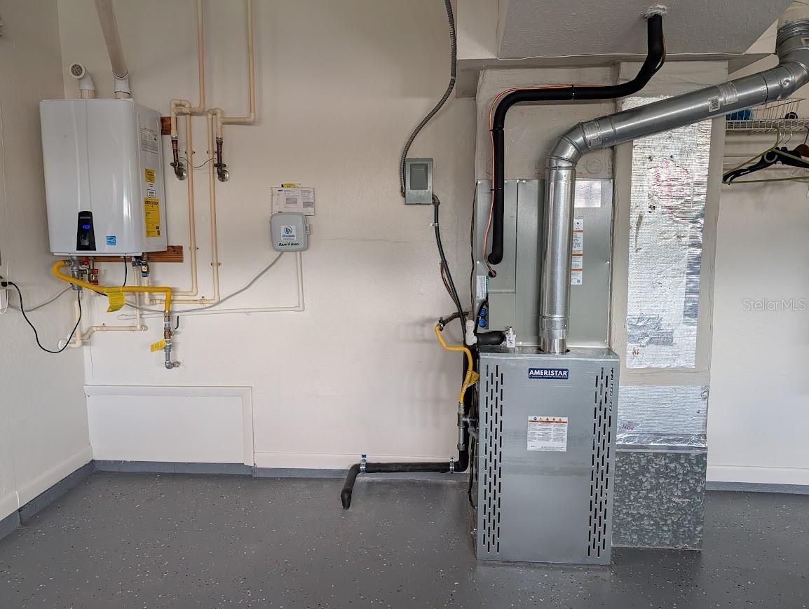 Tankless gas water heater and newly installed gas furnace / AC