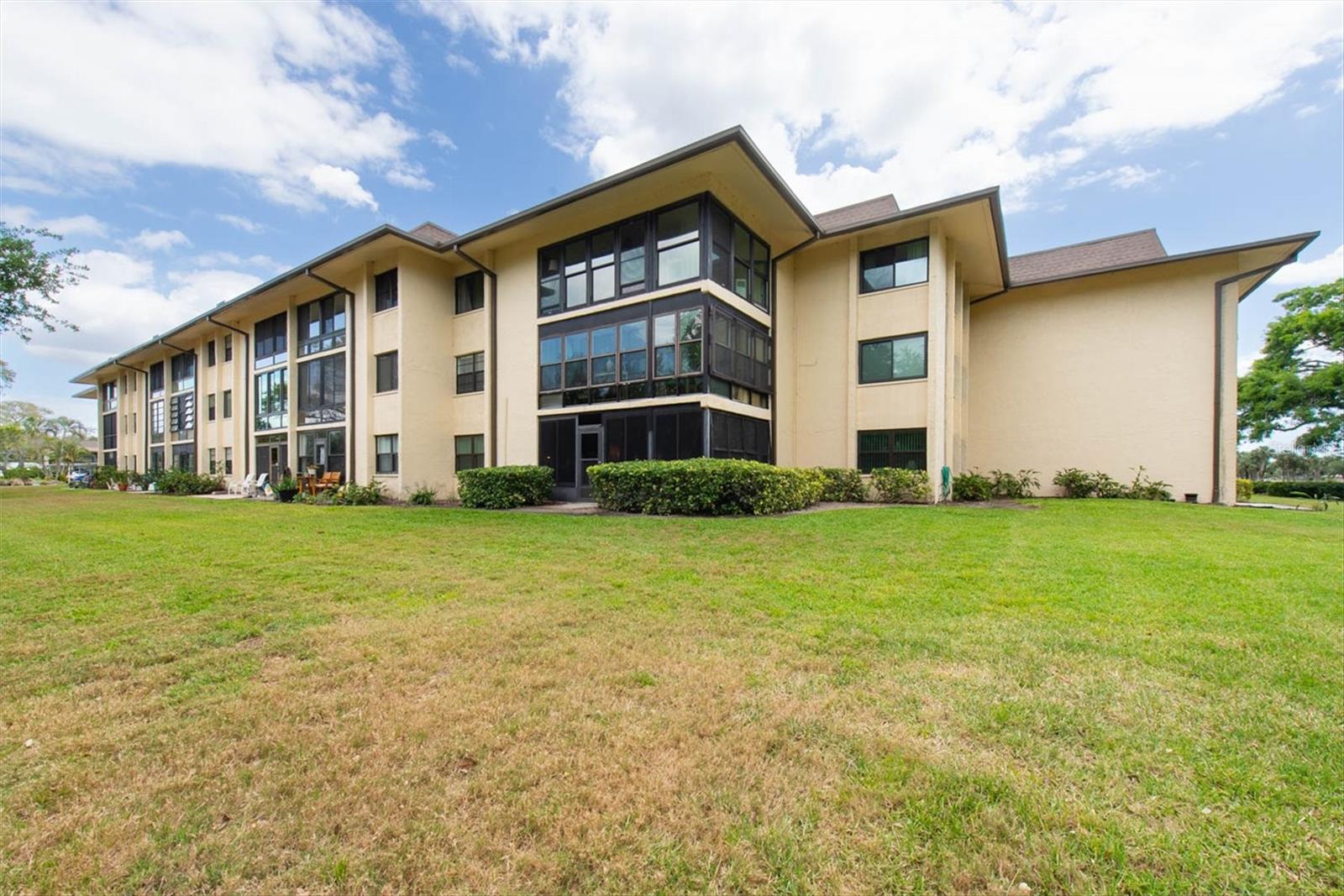 Outside area outside the back door and the view of the back of Building 4