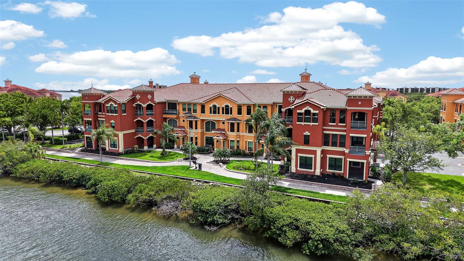 Located waterfront alongside the lighted walking trail