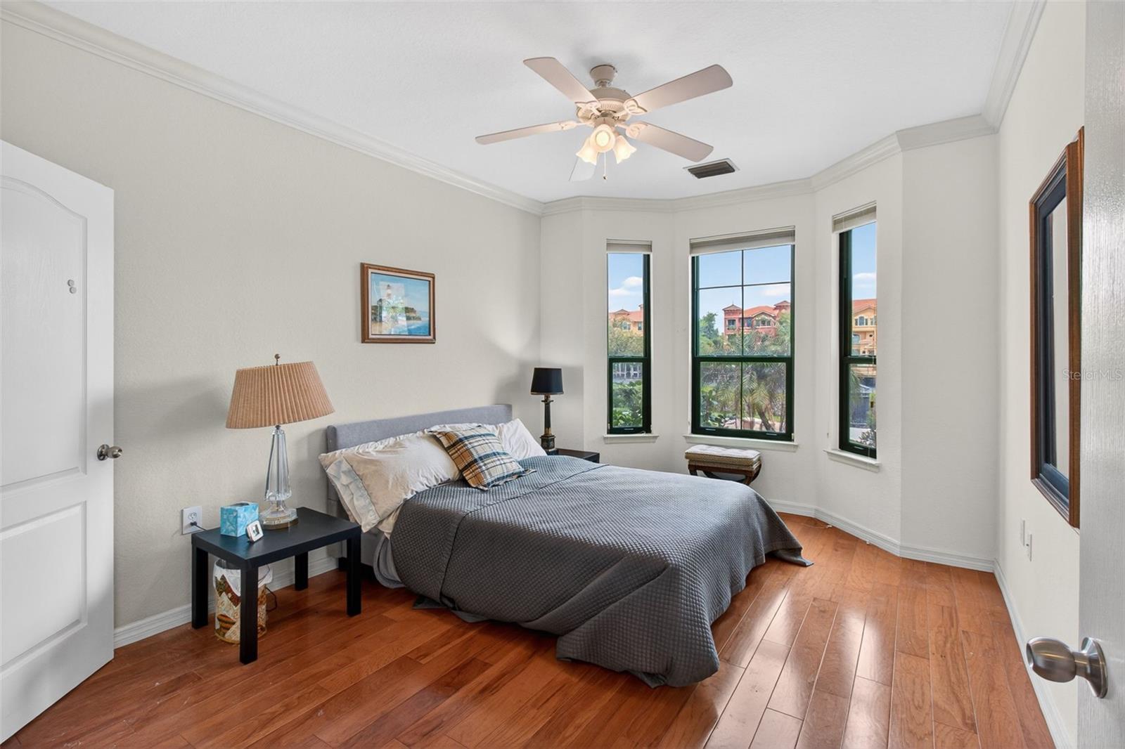 First floor primary with water views and walk-in closet