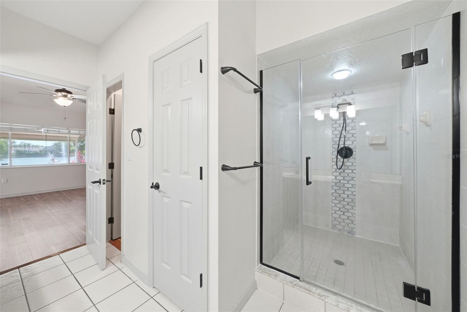 Primary Bathroom and you can see the primary and view of the water. Heaven!