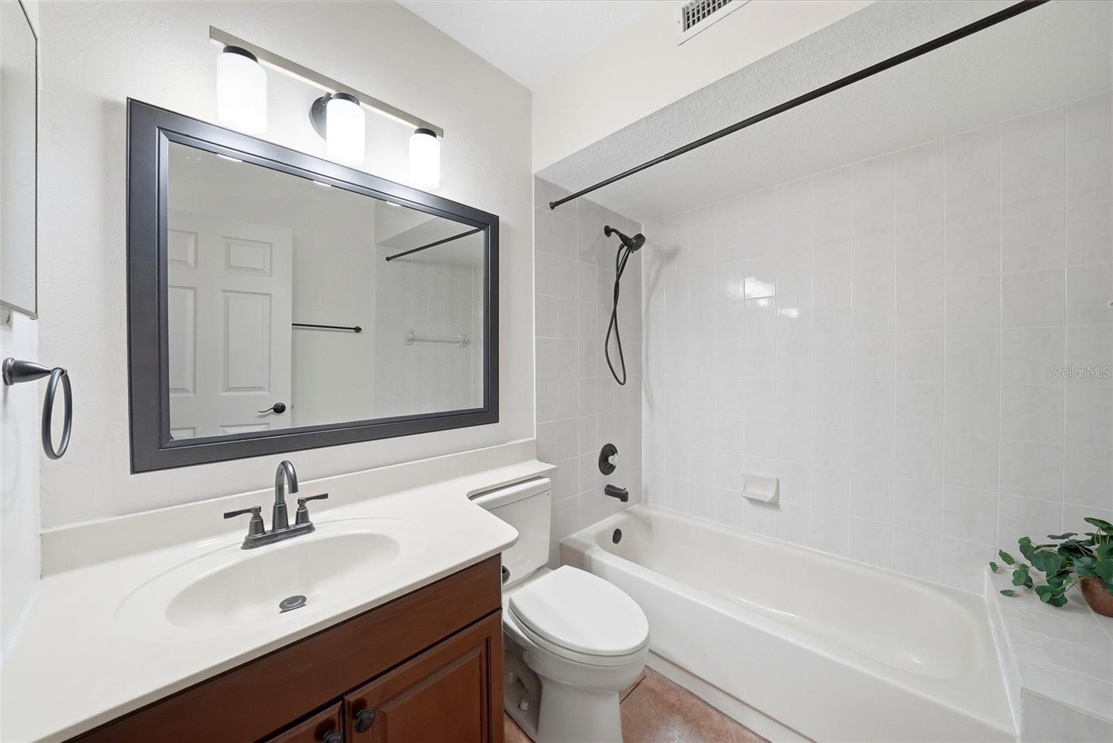 Bathroom next to second bedroom