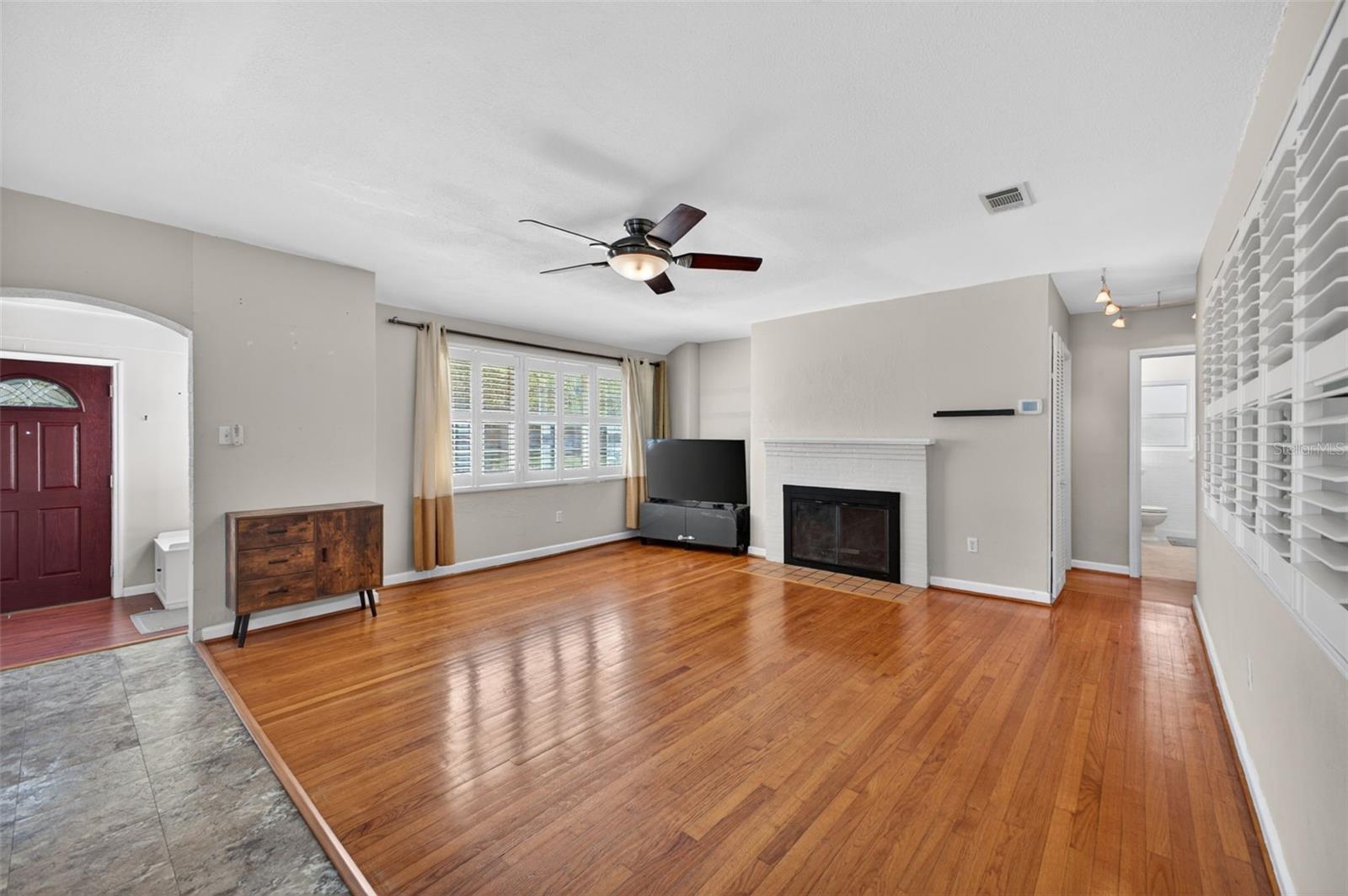 Large Family Room With Wood Burning Fireplace for those chilly nights