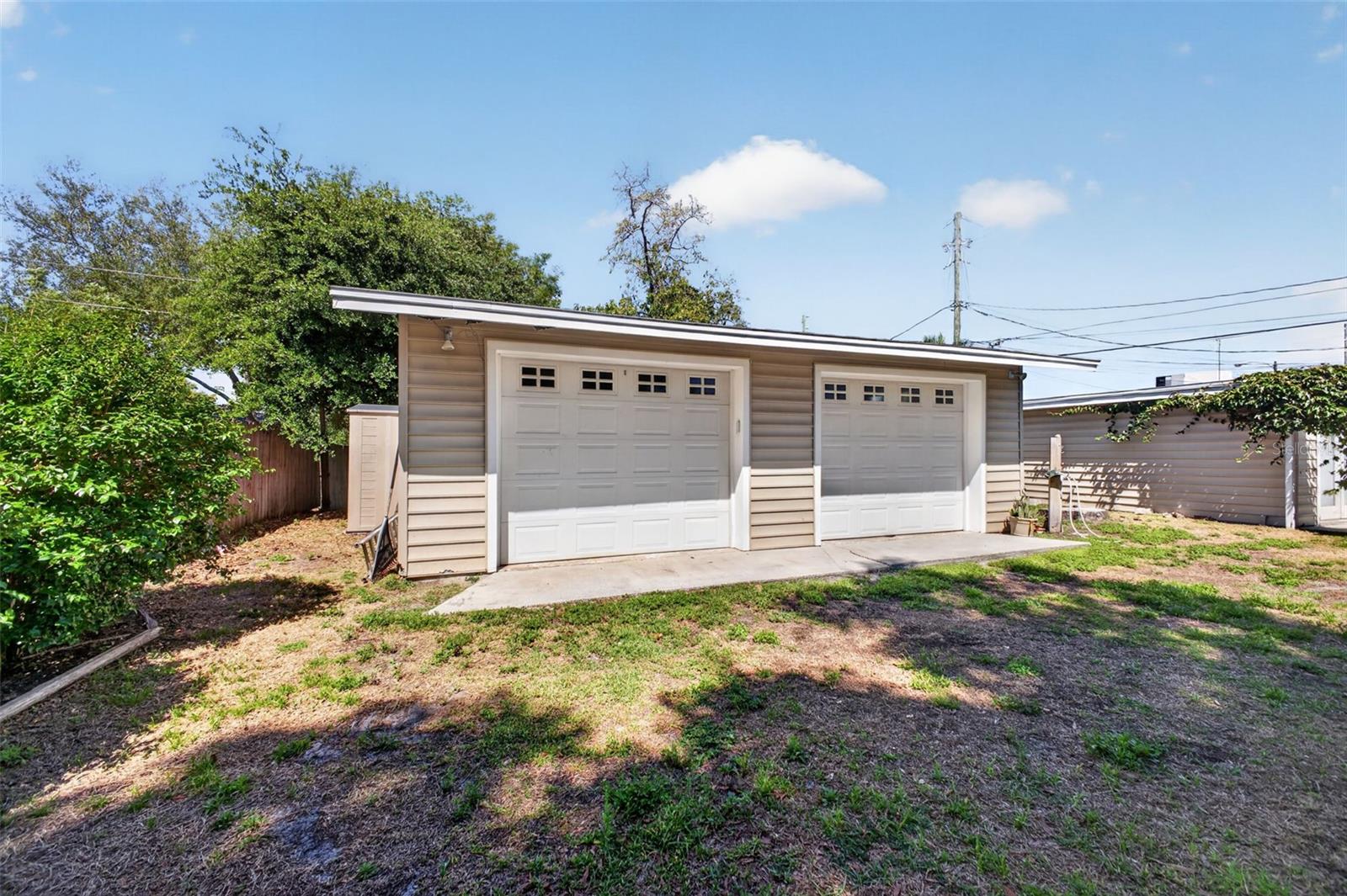 Oversized detached garage and workshop with extra storage space