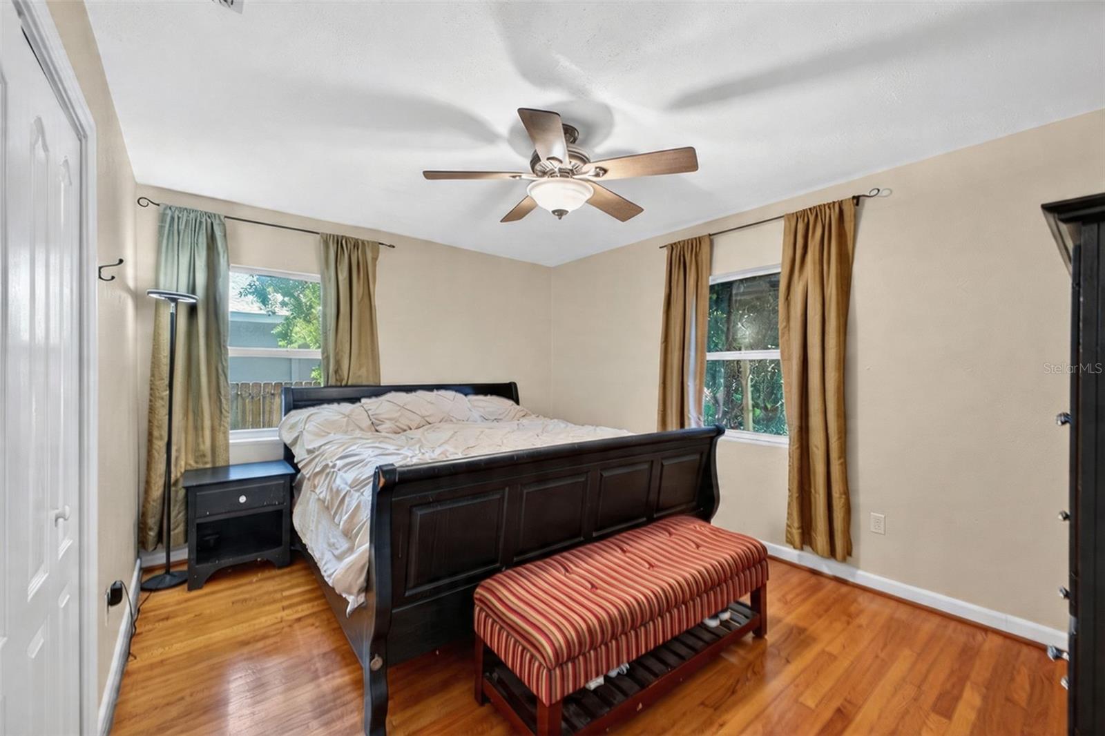 Spacious primary bedroom with natural light and comfortable layout