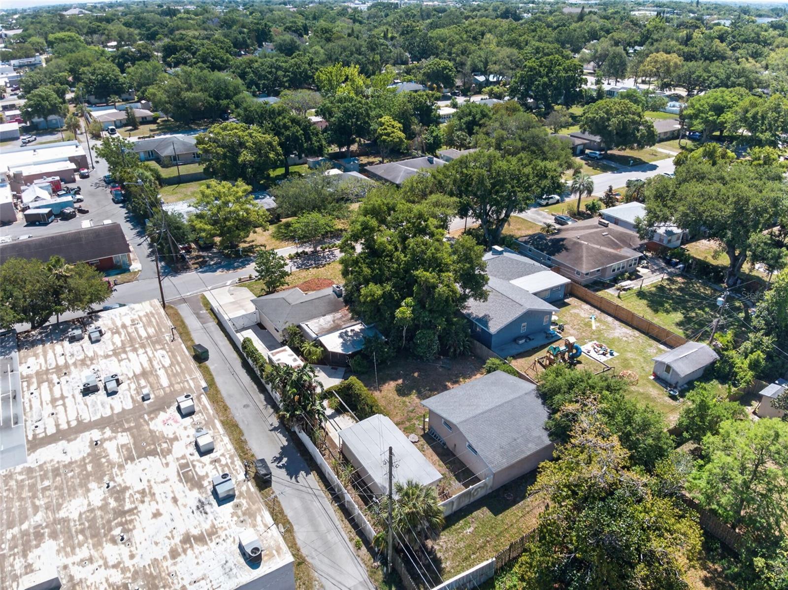Drone View Of The Large Lot, Home and Out Buildings