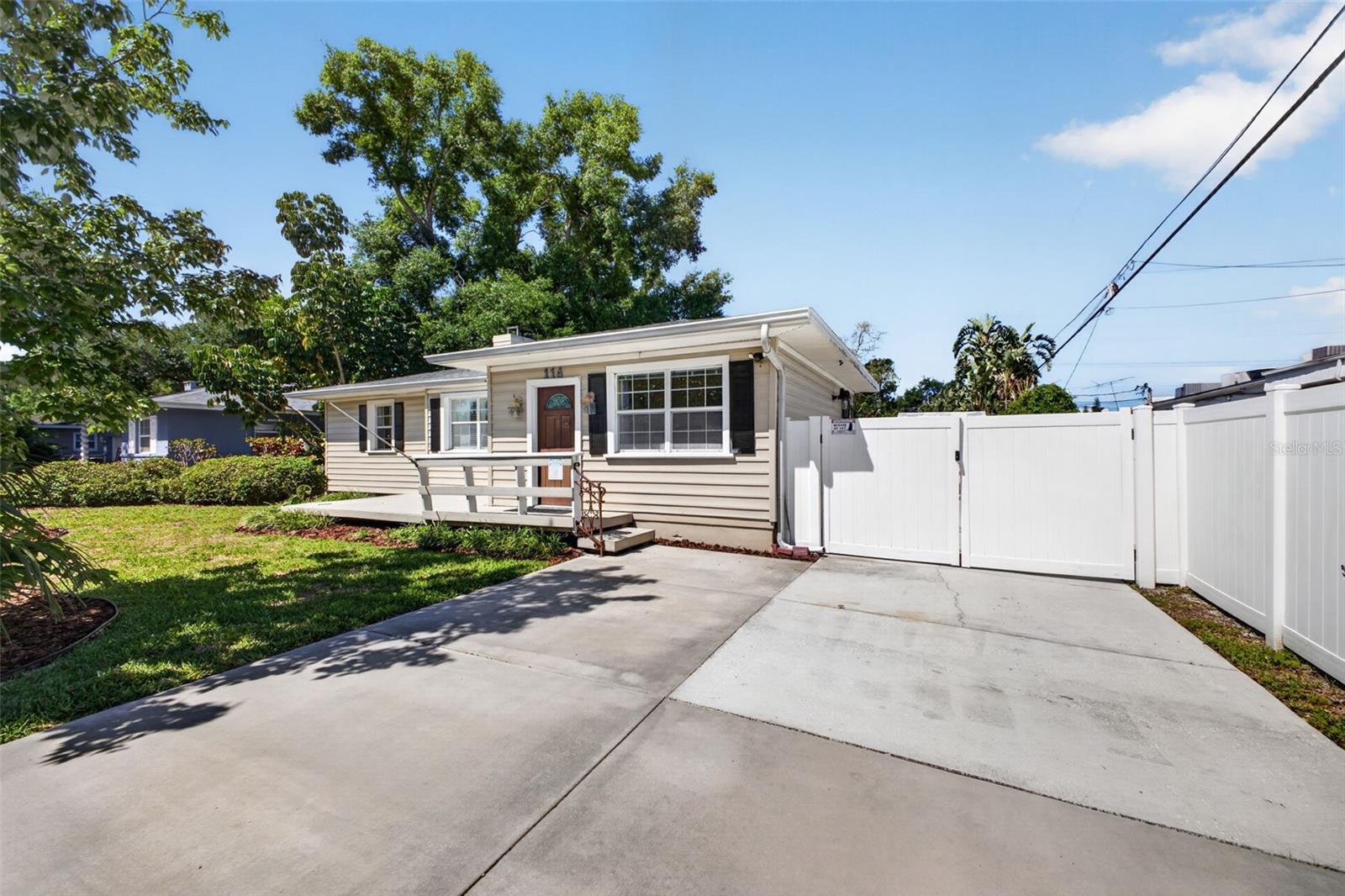 Long driveway and parking behind the front gate for an RV or Boat