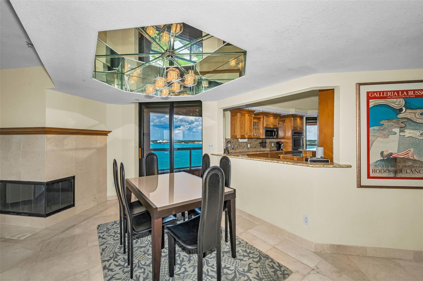 Dining Area with an Abundance of Natural Light, Aquamarine Panorama and Multiple Terrace Access.