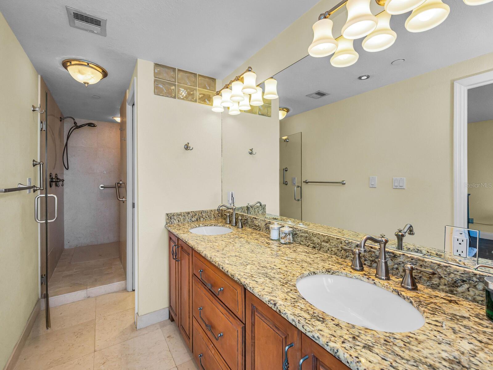Master Bath, Dual Sink Vanity and Open Walk In Shower.