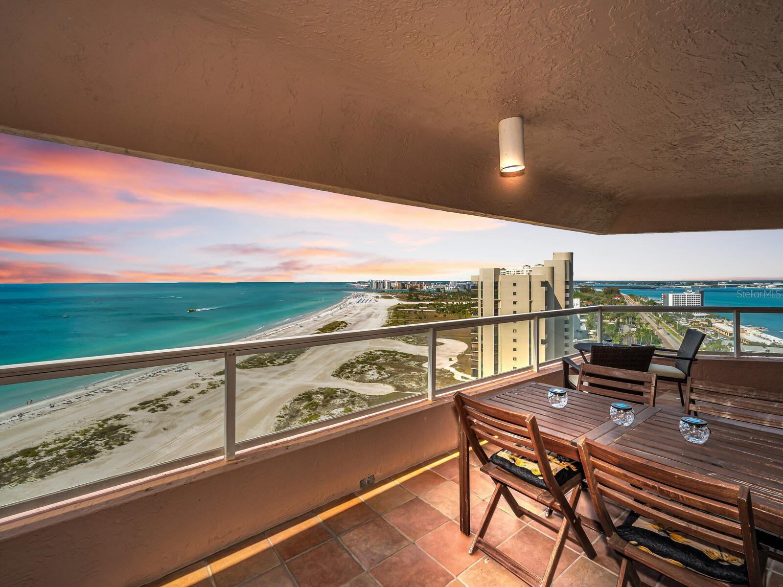 Wow Factor Terrace featuring Sweeping Aquamarine Seascapes, Balmy Beach Breezes and Lighted Clearwater Harbor Panorama!