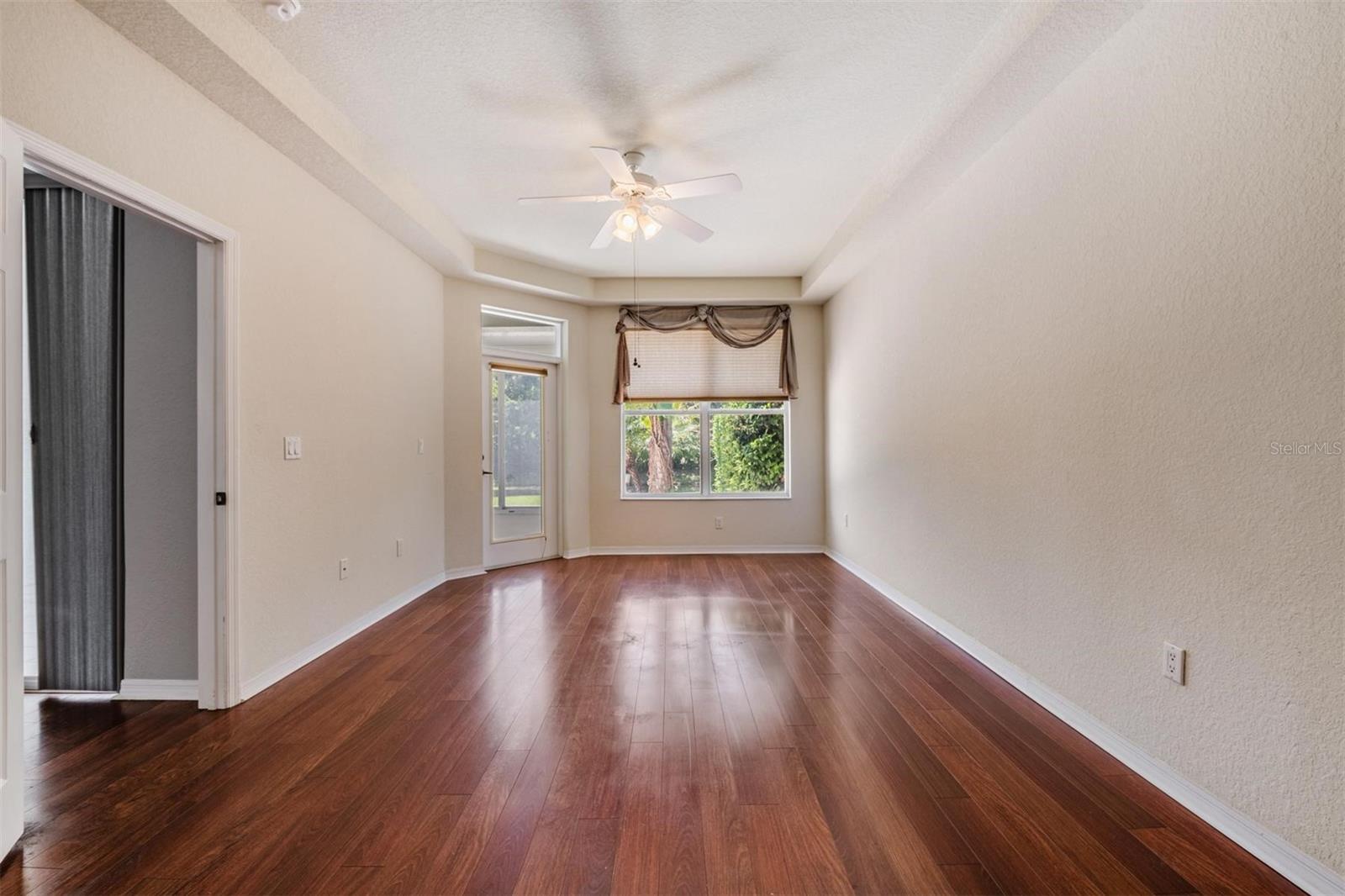 Primary Bedroom with door leading to Lanai