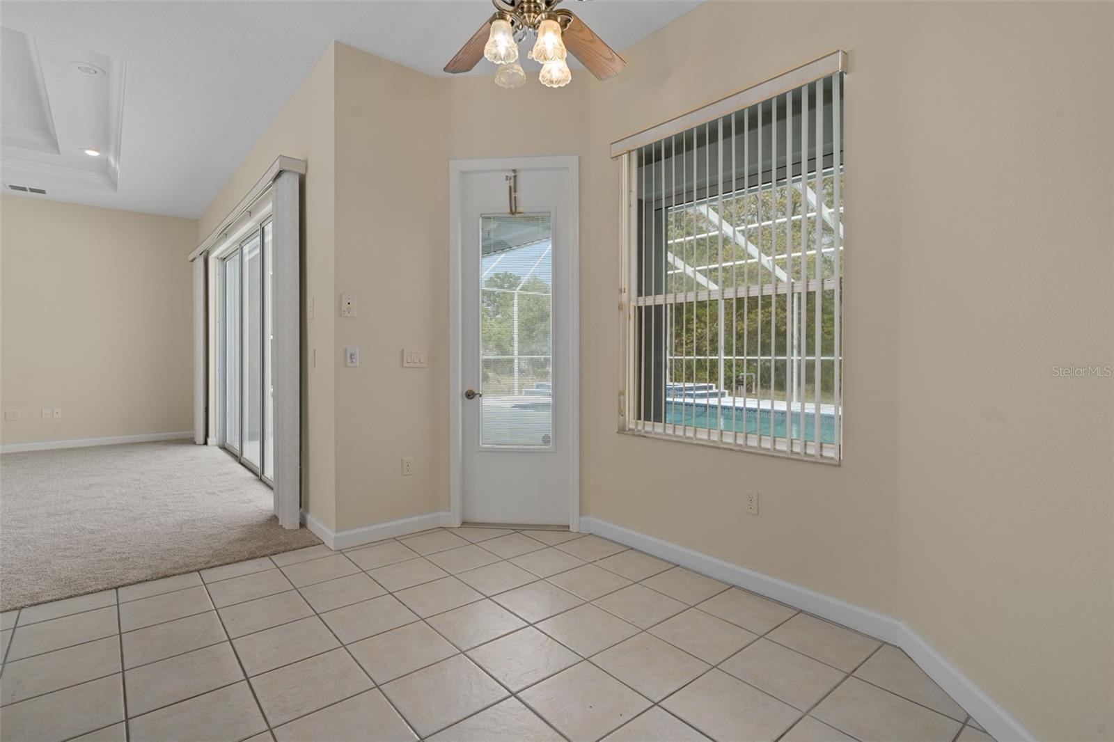 DINETTE TO GREAT ROOM AND POOL