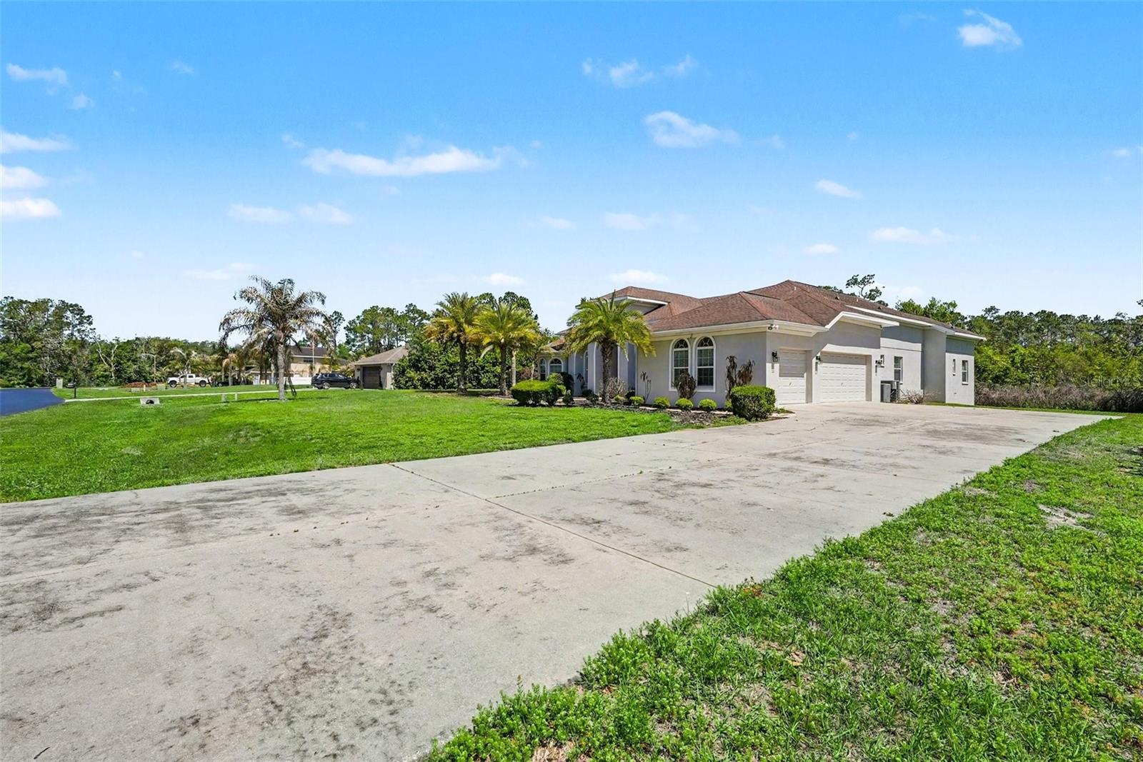 Huge driveway & triple garage