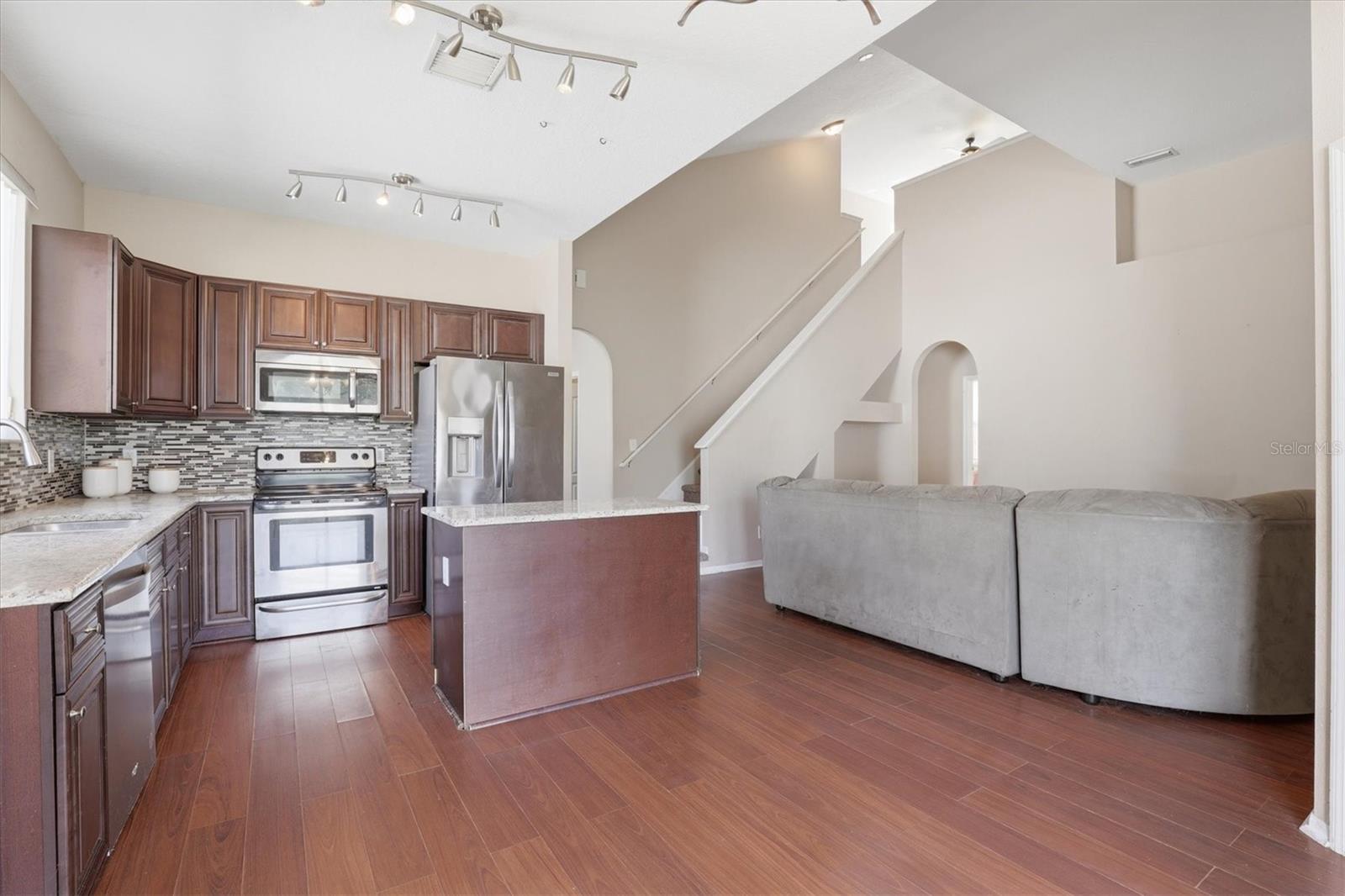 Open Kitchen Concept Overlooking the Family Room