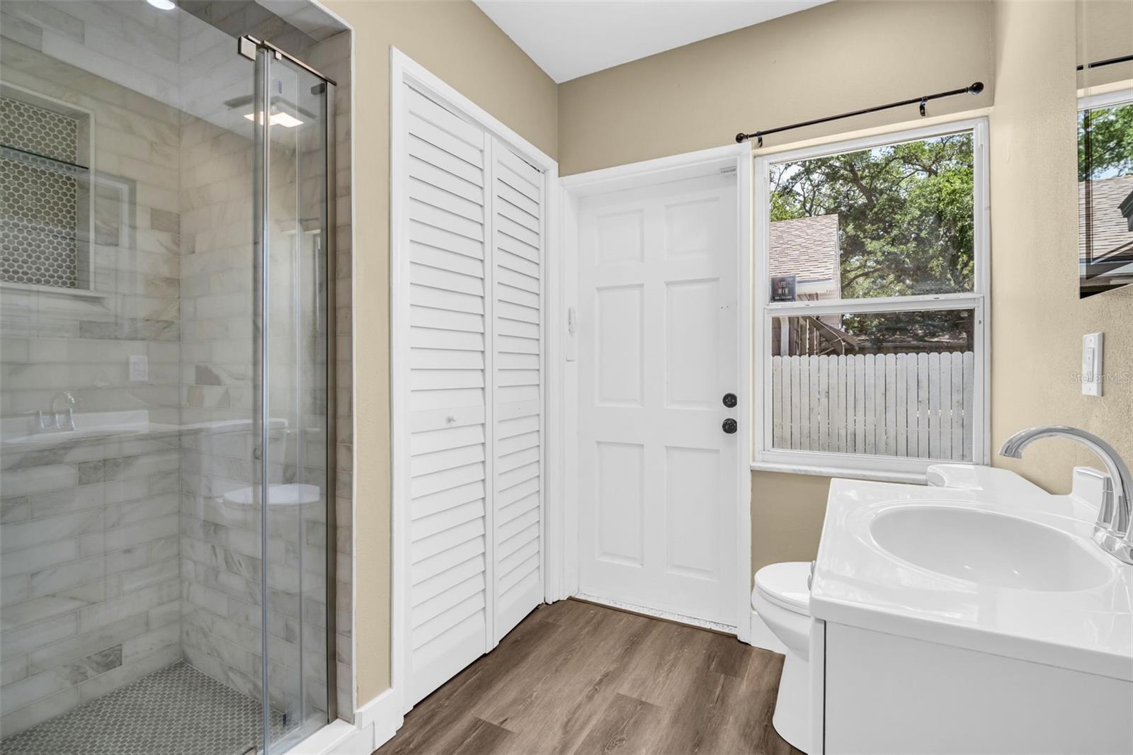 Master shower & linen closet