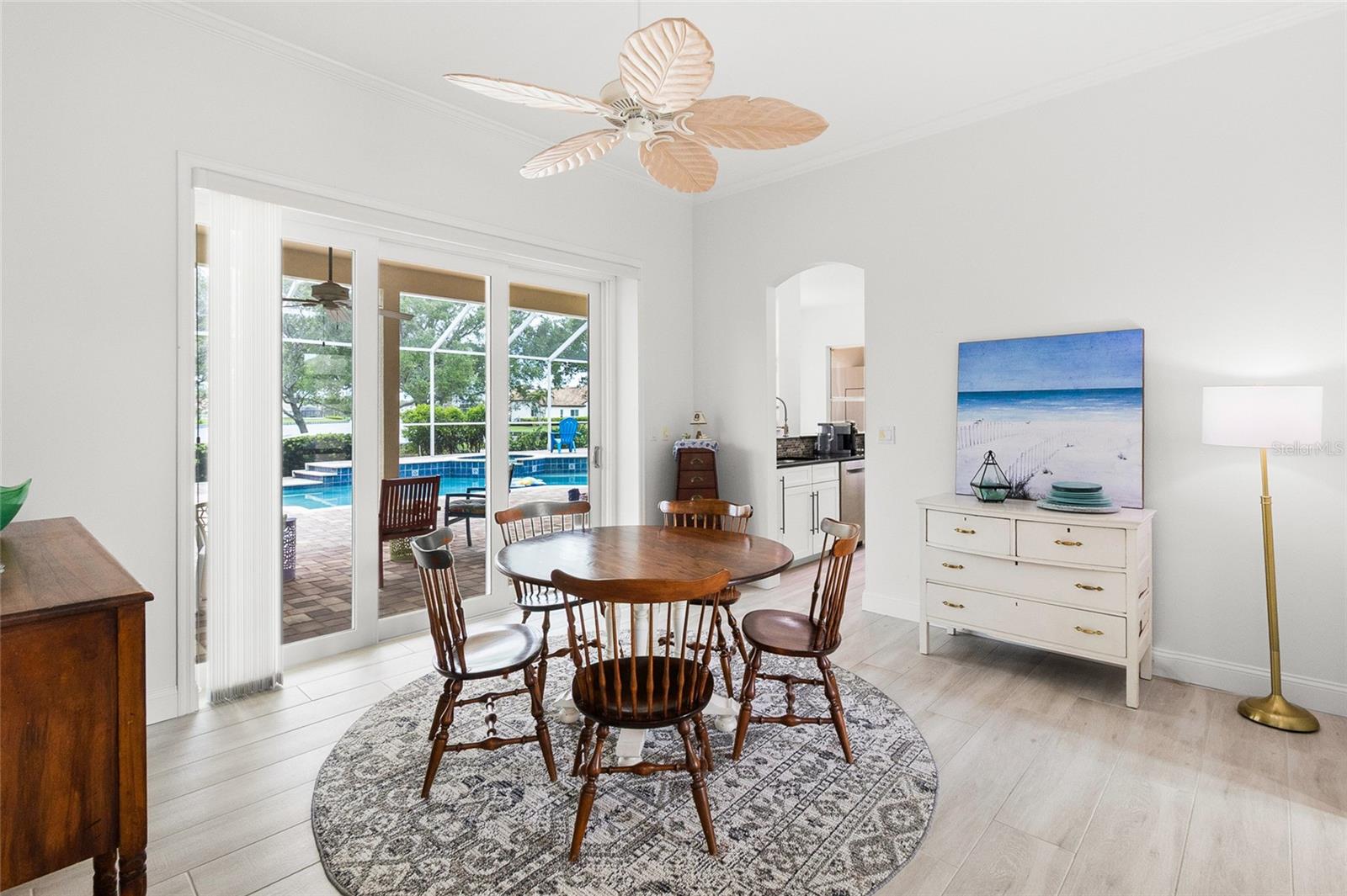 Sliding doors stack behind the wall, leaving a completely open access.  Great for parties!