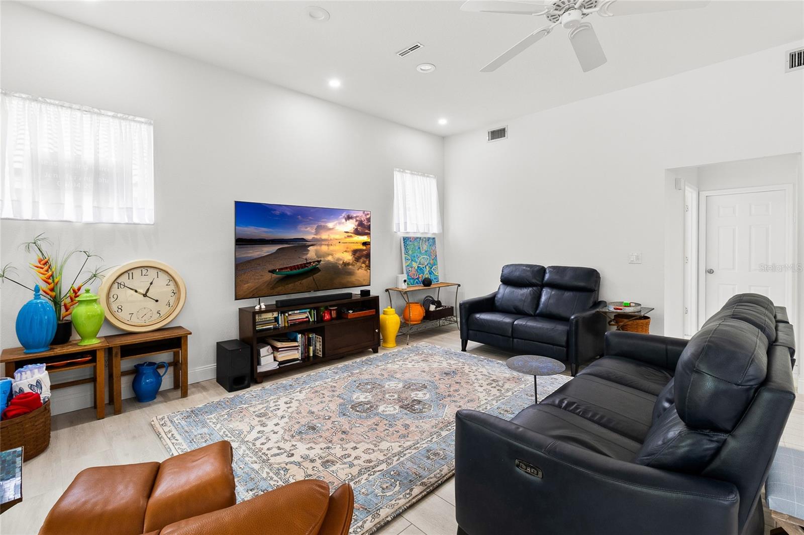 Perfect set up for movie night!  Close to snacks and drinks, and a 75 inch TV for all the action!  TV conveys.