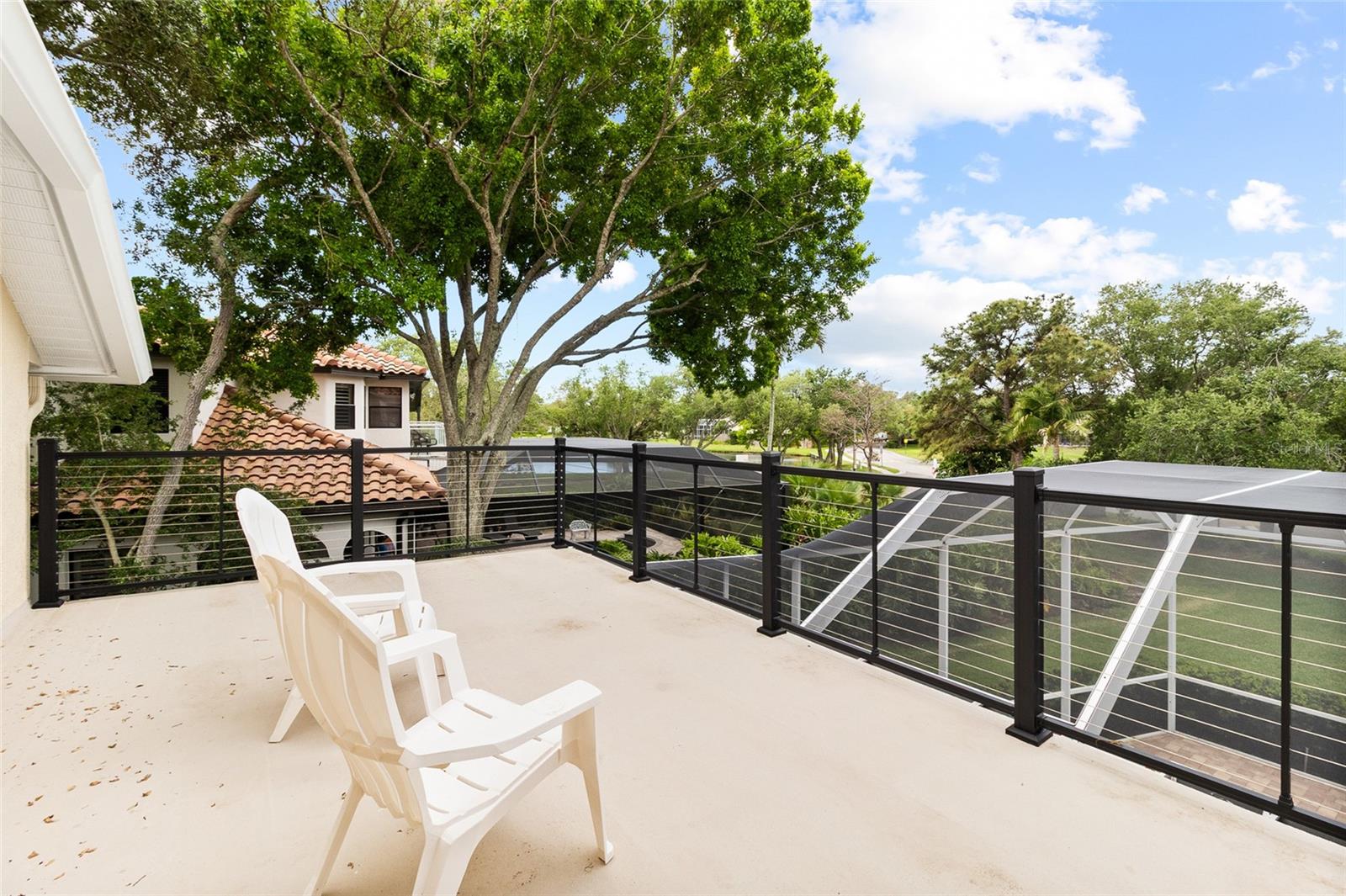 Balcony off primary bedroom allows you to take in the view