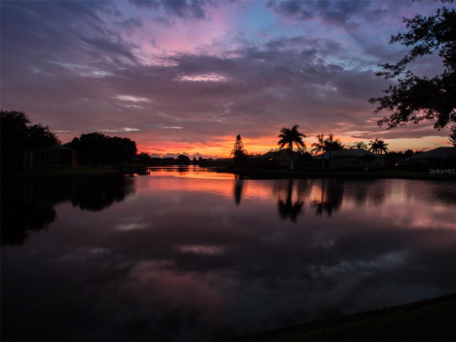 view of the lake at sunset