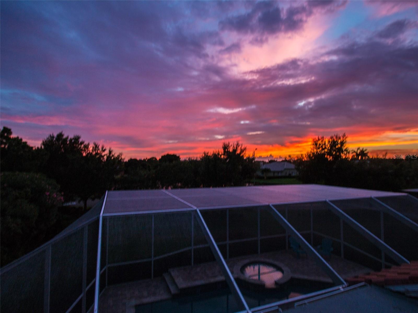 Sunset view from primary bedroom balcony