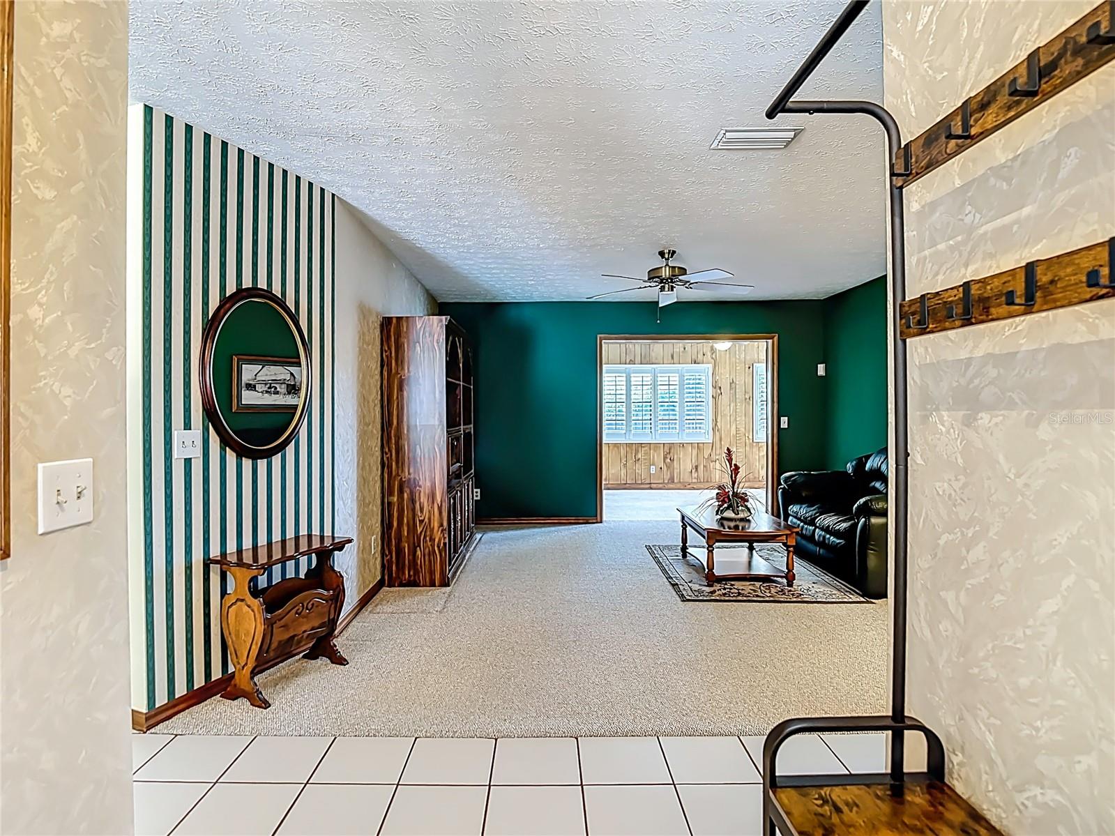 Past foyer is the formal living room.