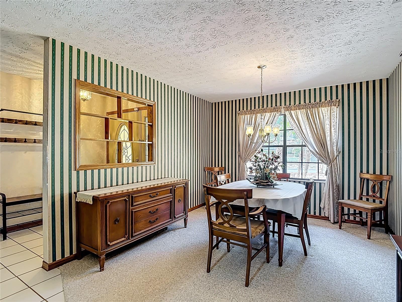 Formal dining room or good home office area.