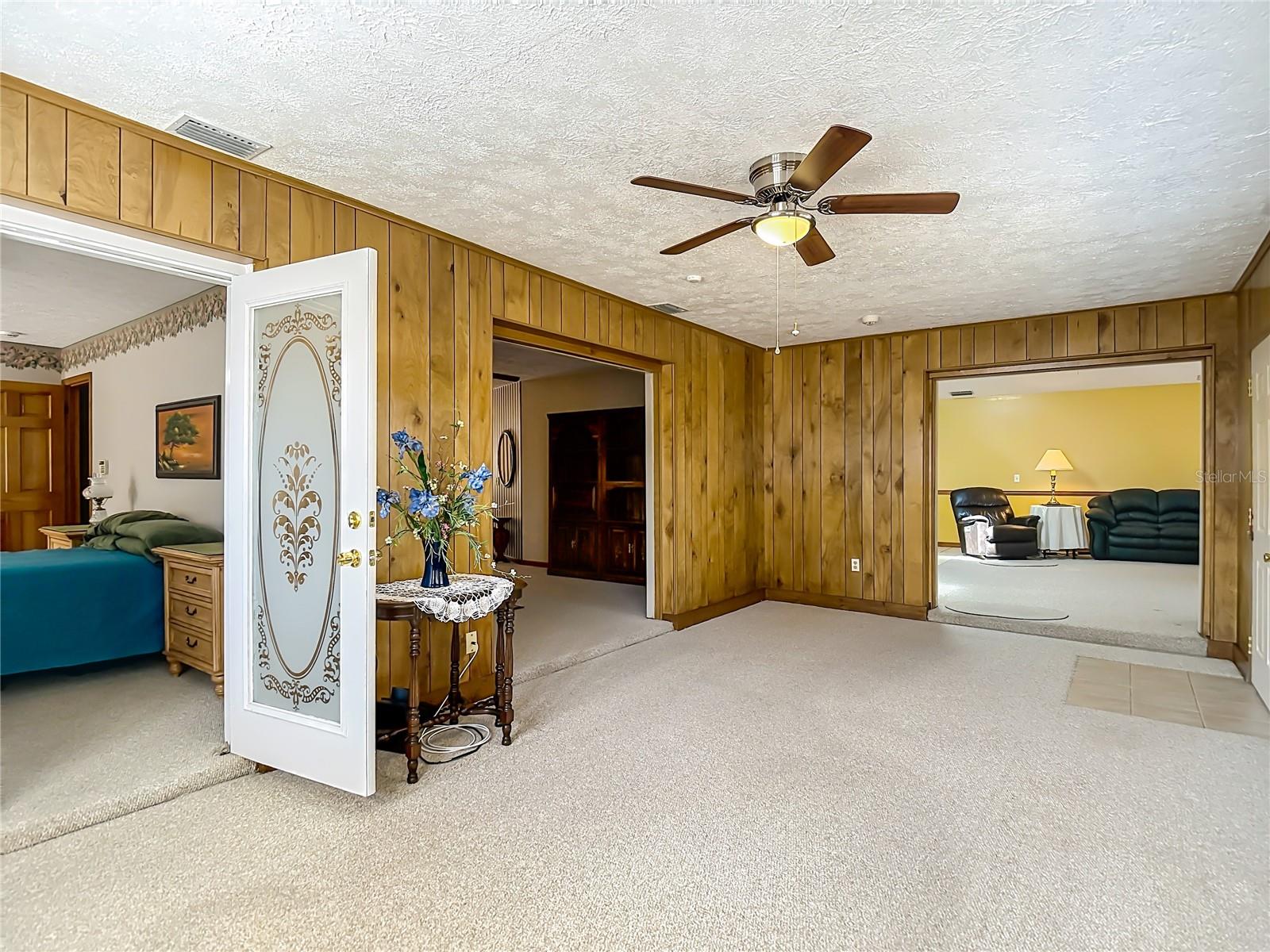 Each room accesses the bonus room--family room, living room and primary suite.