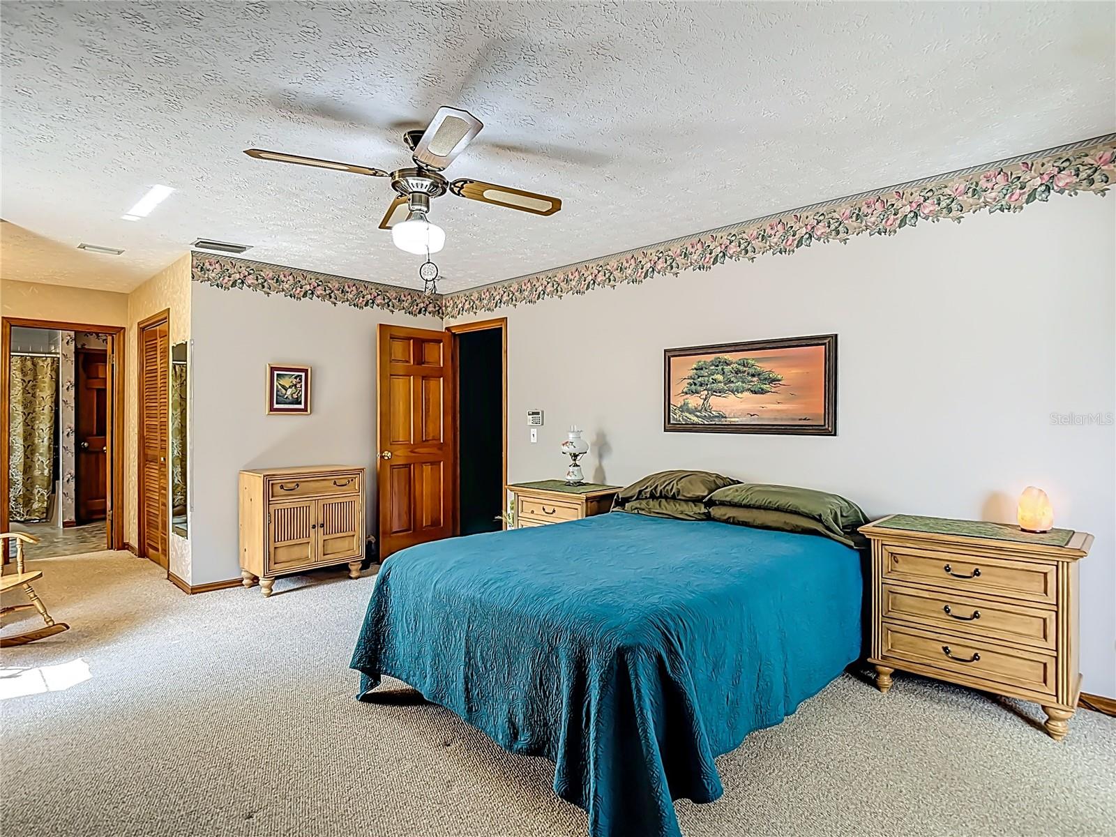 Primary bedroom with ensuite bath.
