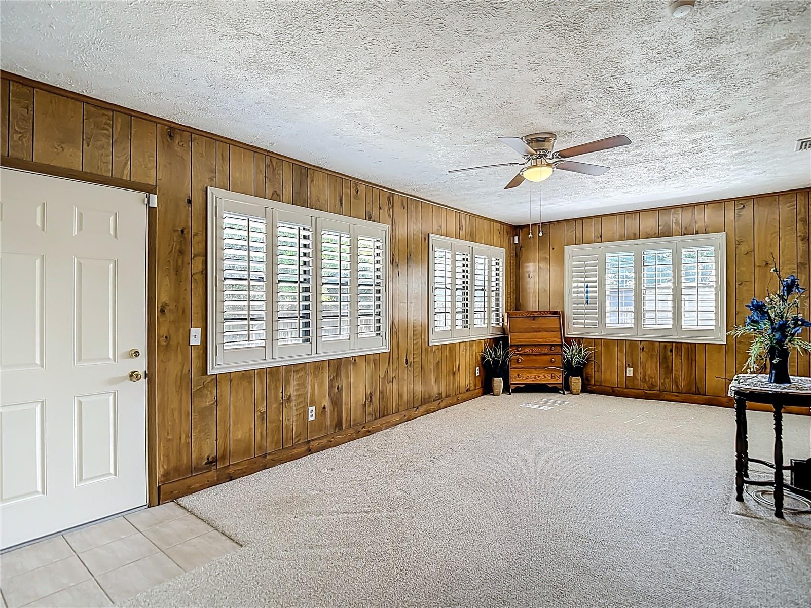 Huge bonus room with plantation shutters.