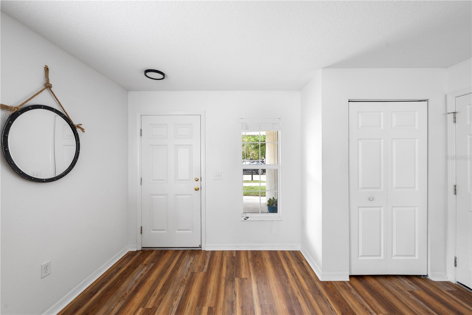 Front Inside Door with Closet on the Right