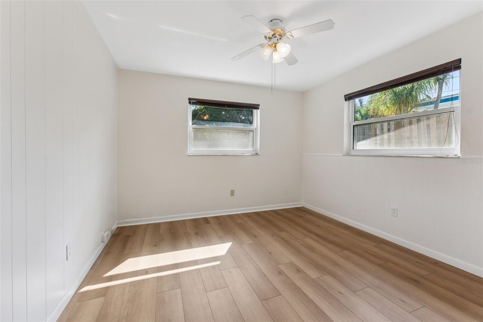 Bright and inviting, Bedroom 2 offers plenty of space for rest, work, or play