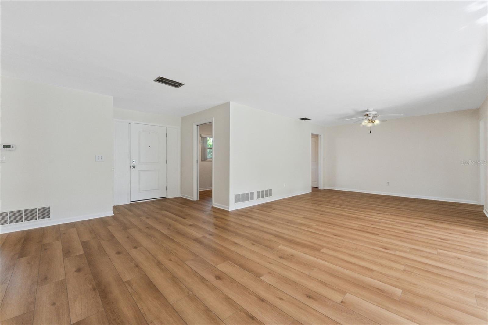 Step into style with brand new luxury vinyl plankflooring flowing throughout the home—durable,elegant, and effortlessly modern