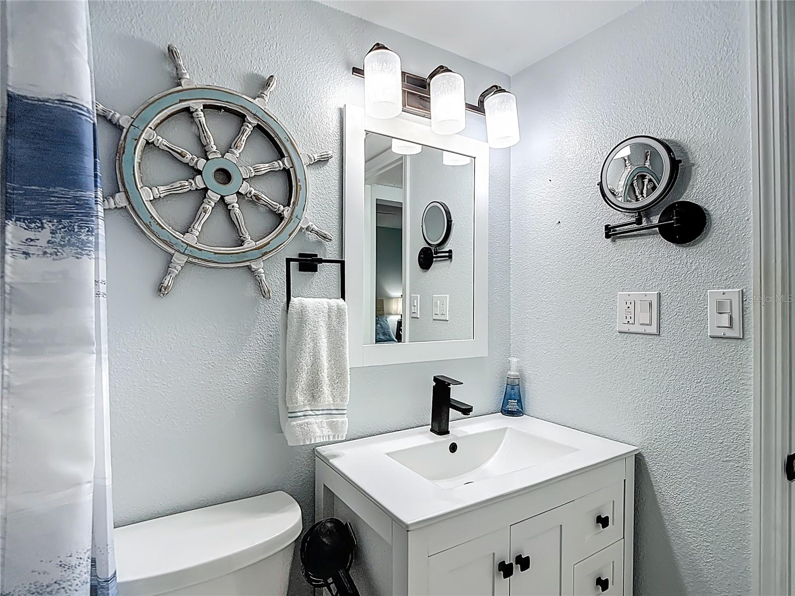 Modern coastal bathroom.