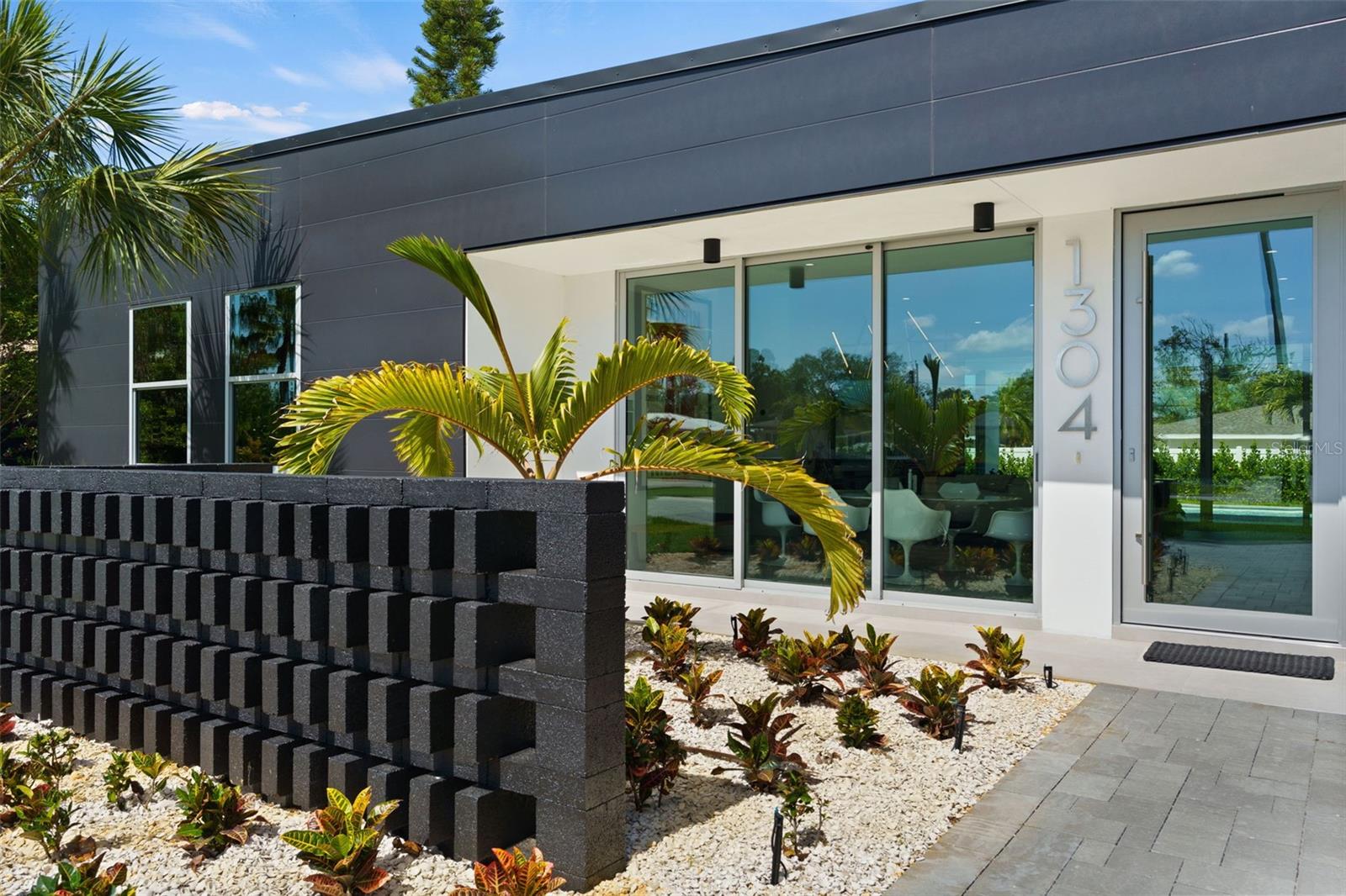 Breeze Block Creates a Courtyard Entry