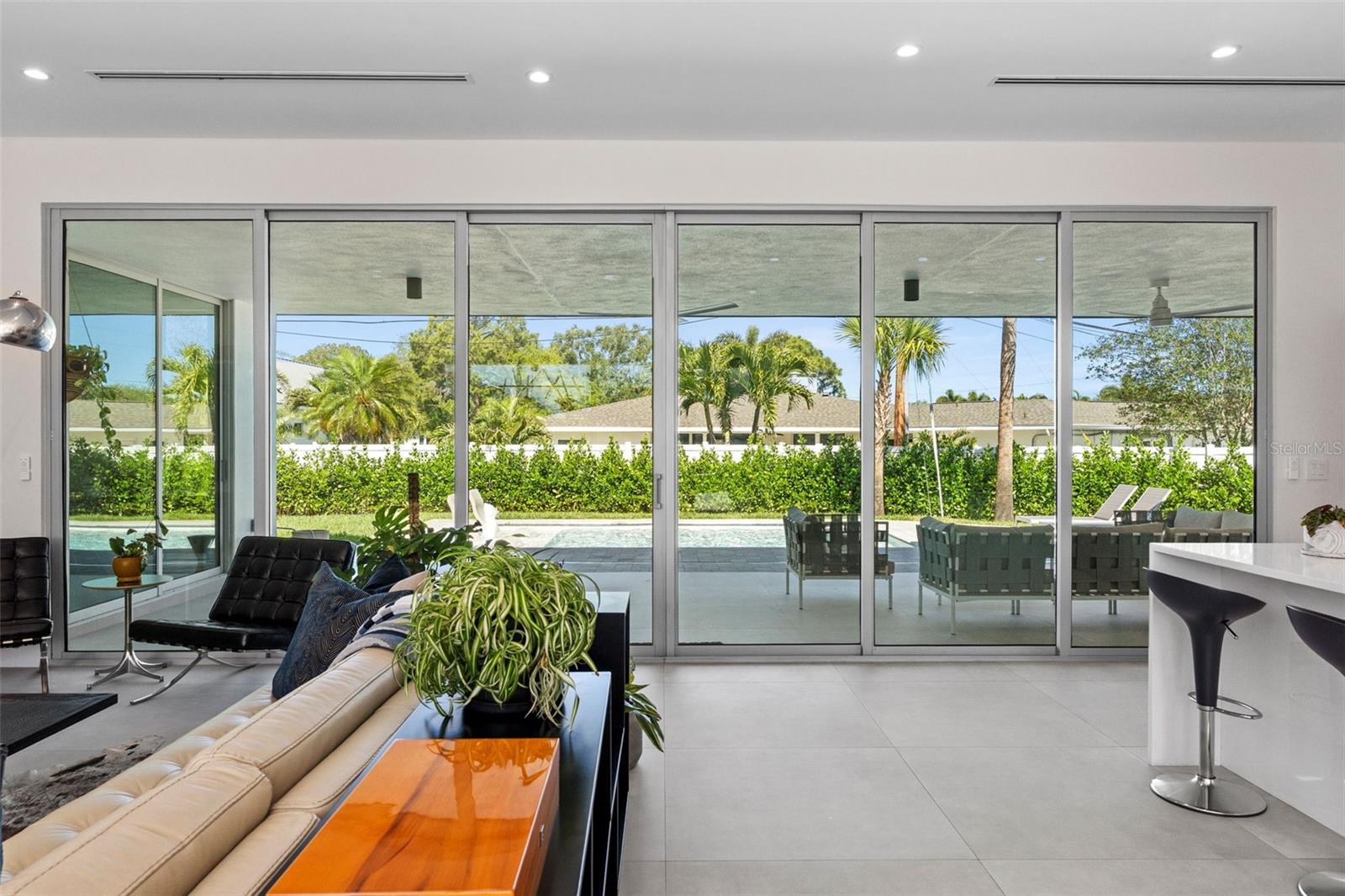 A sliding wall of glass to bring the outside in!