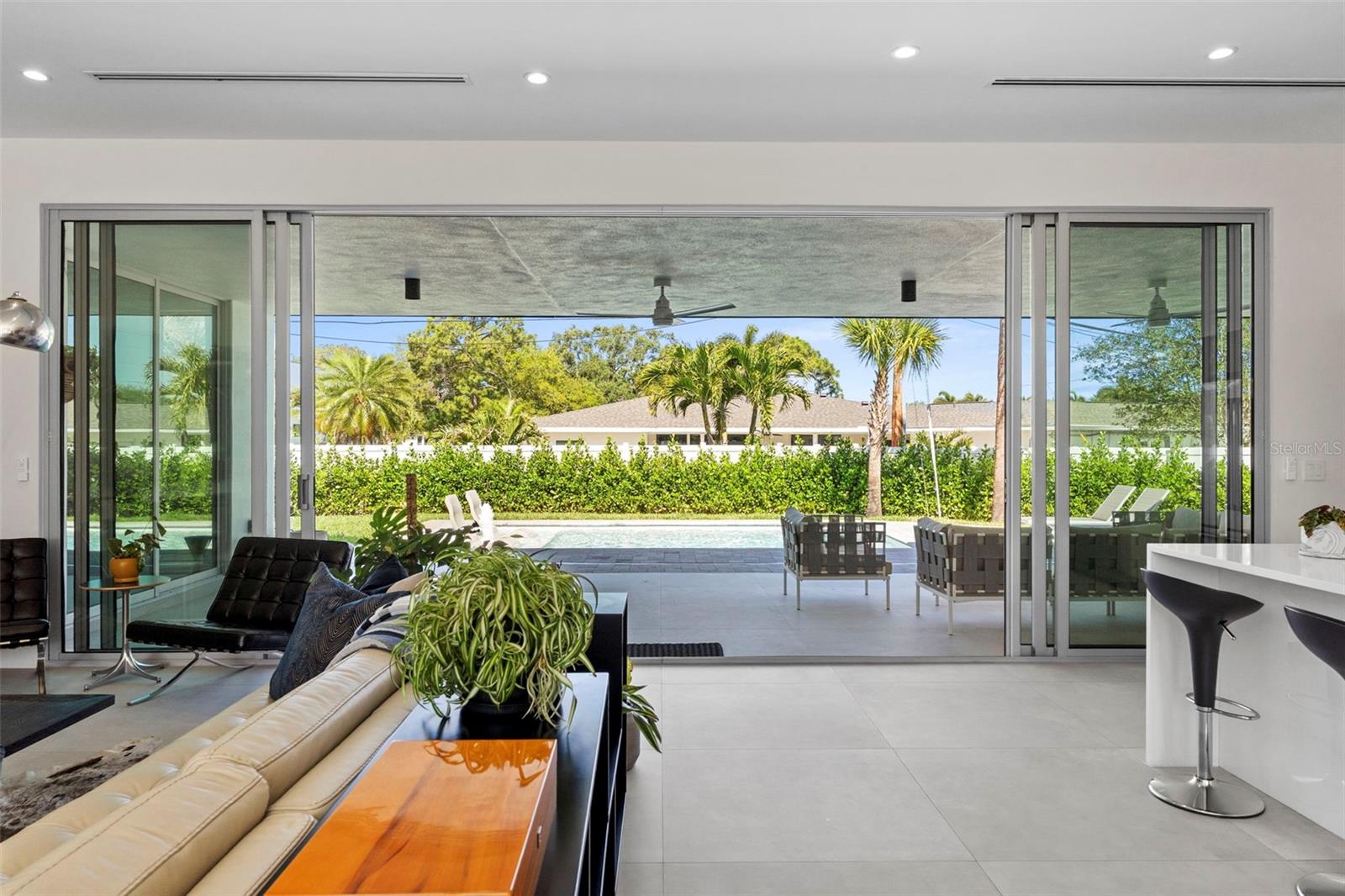 This Home Seamlessly Connects Inside Your Home With Your Spacious Outdoor Living & Pool Area.