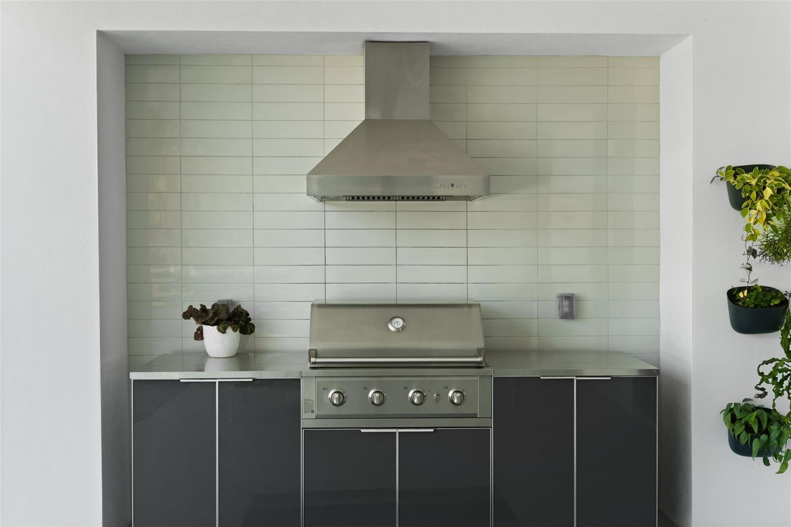 Grilling Is A Pleasure With This Covered Outdoor Kitchen.