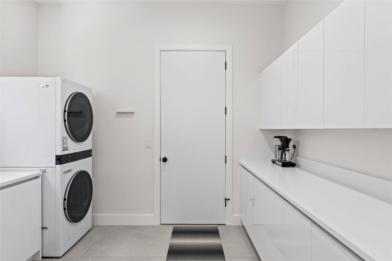 Laundry Room toward the Attached Two Car Garage