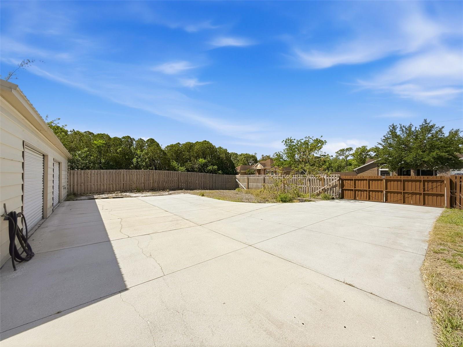 Parking pad in front of Detached Garage w/room for boats or RVs