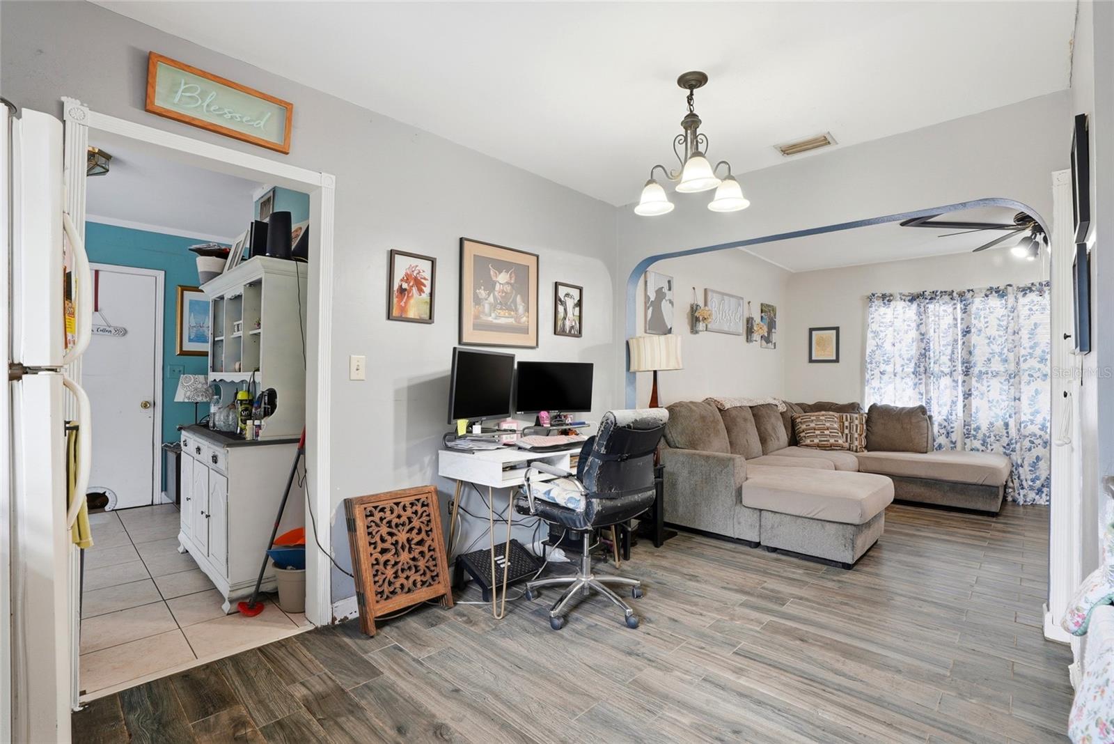 Living Room and door to Den off kitchen