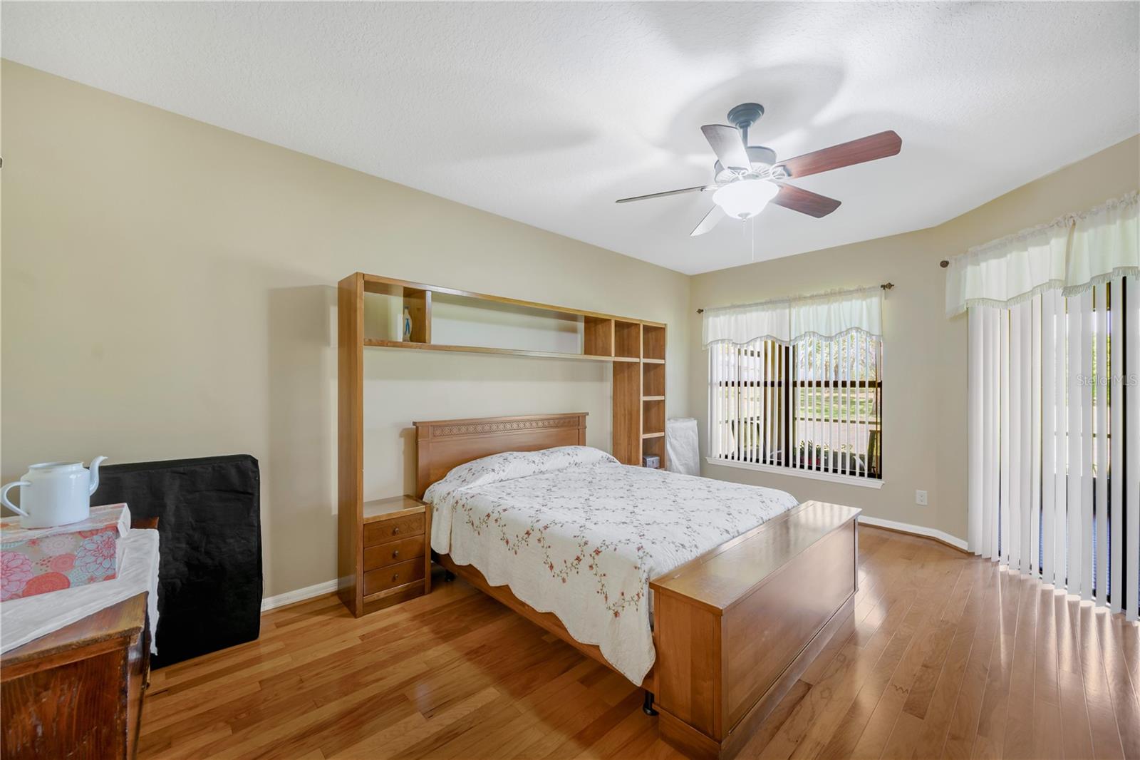 The floors in all the bedrooms add timeless style, create a cozy and inviting atmosphere, and offer easy maintenance compared to carpet—making them both beautiful and practical.