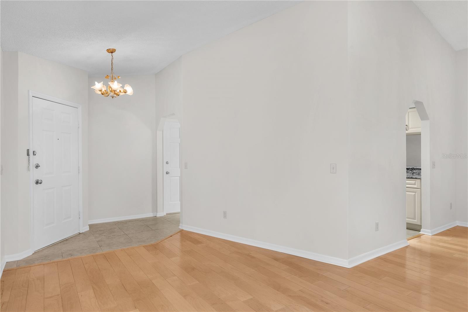 Step inside the front door into a formal living room/dining room combination.