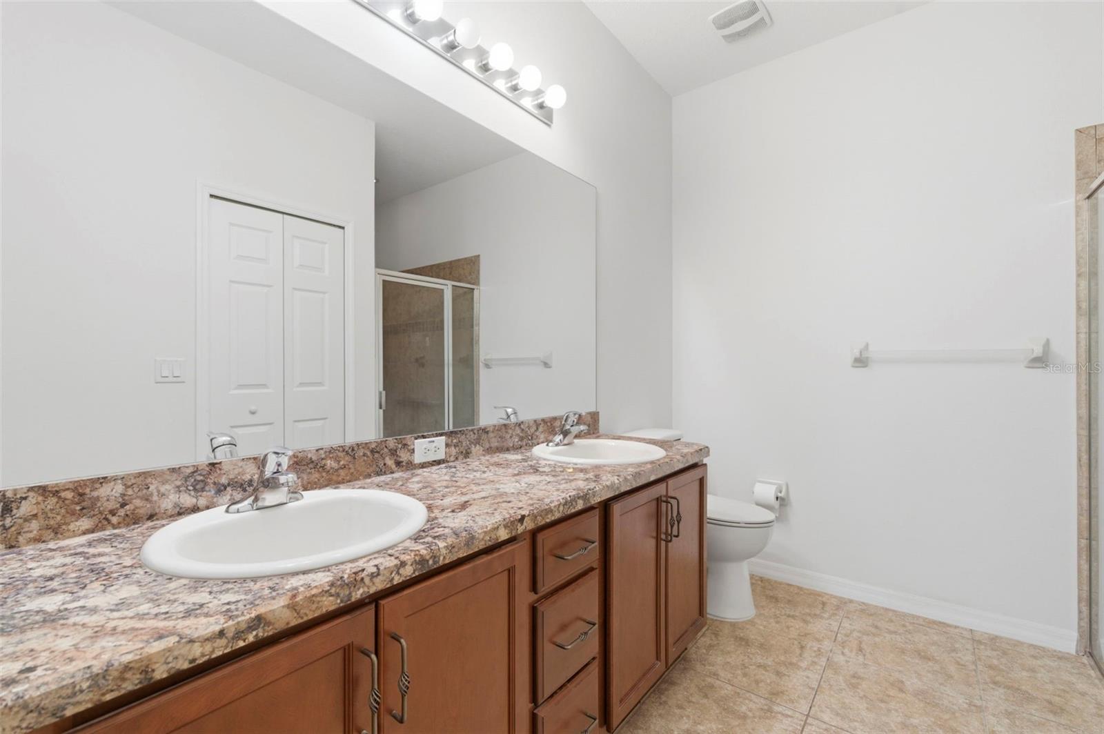 Primary Bathroom and walk-in closet