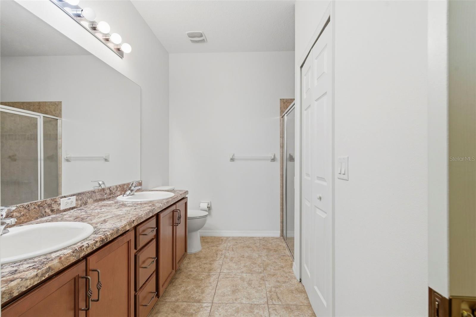 Primary Bathroom and walk-in closet